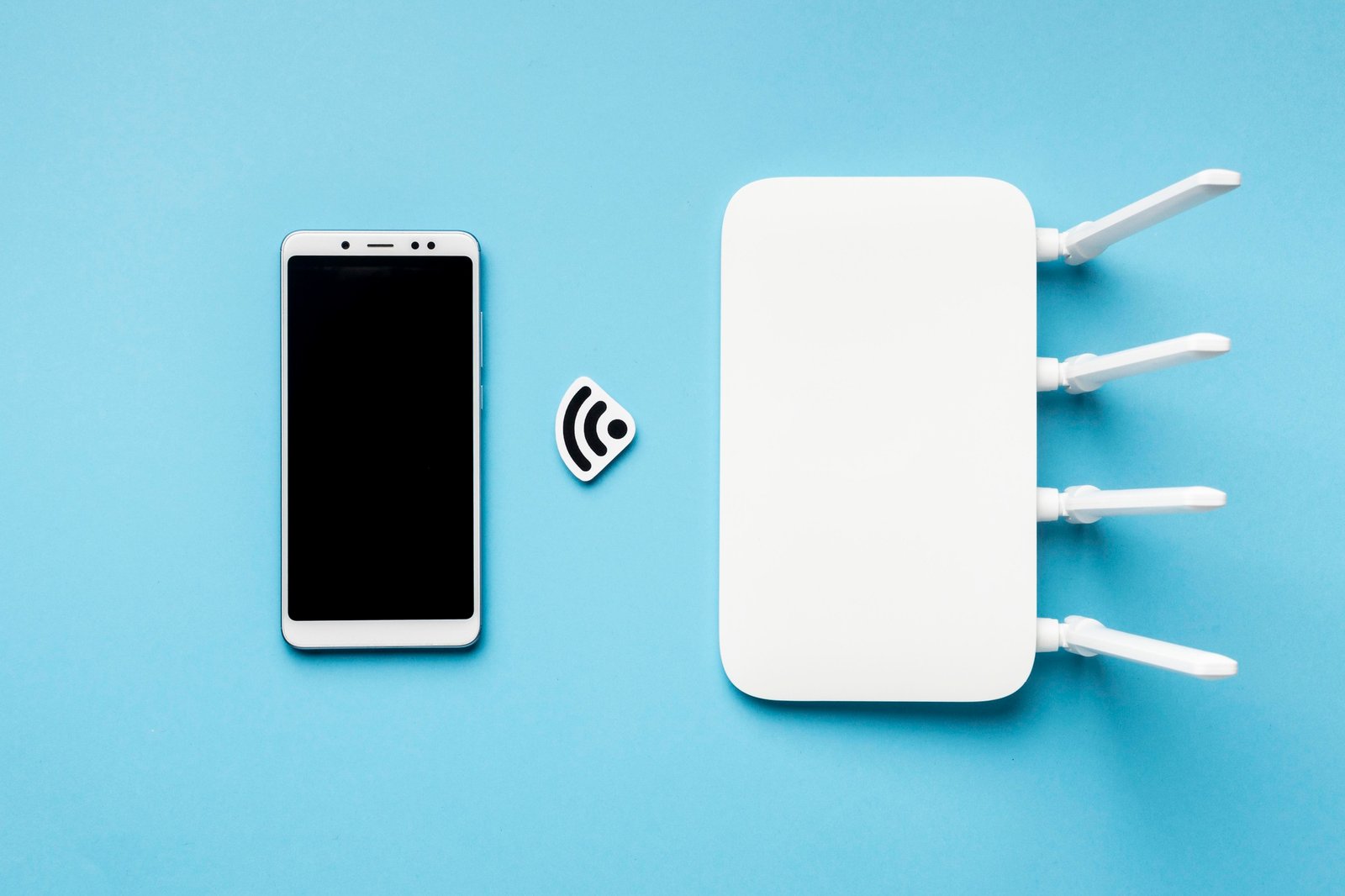 http://img.b2bpic.net/free-photo/top-view-wi-fi-router-with-smartphone_23-2148779231.jpg